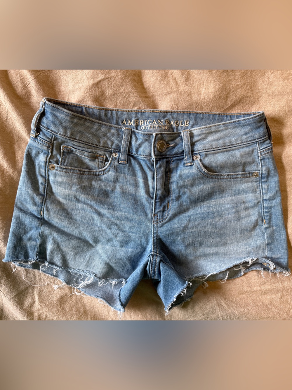 American Eagle Outfitters Light Wash Frayed Hem Denim Shorts